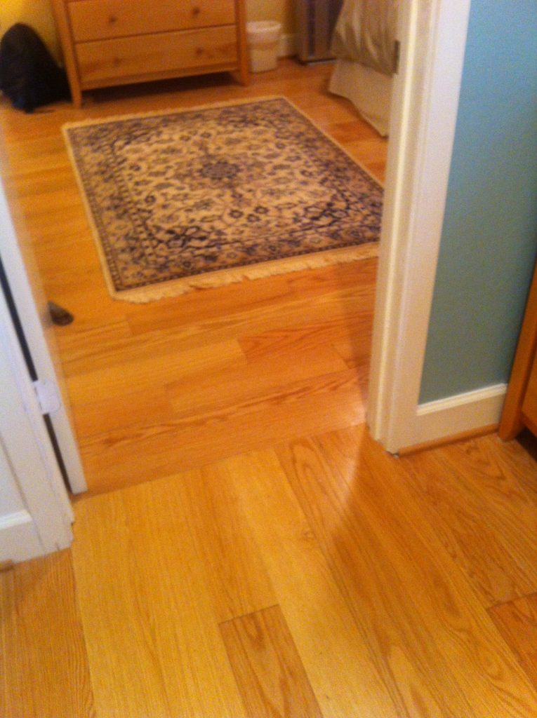 carpet over hardwood